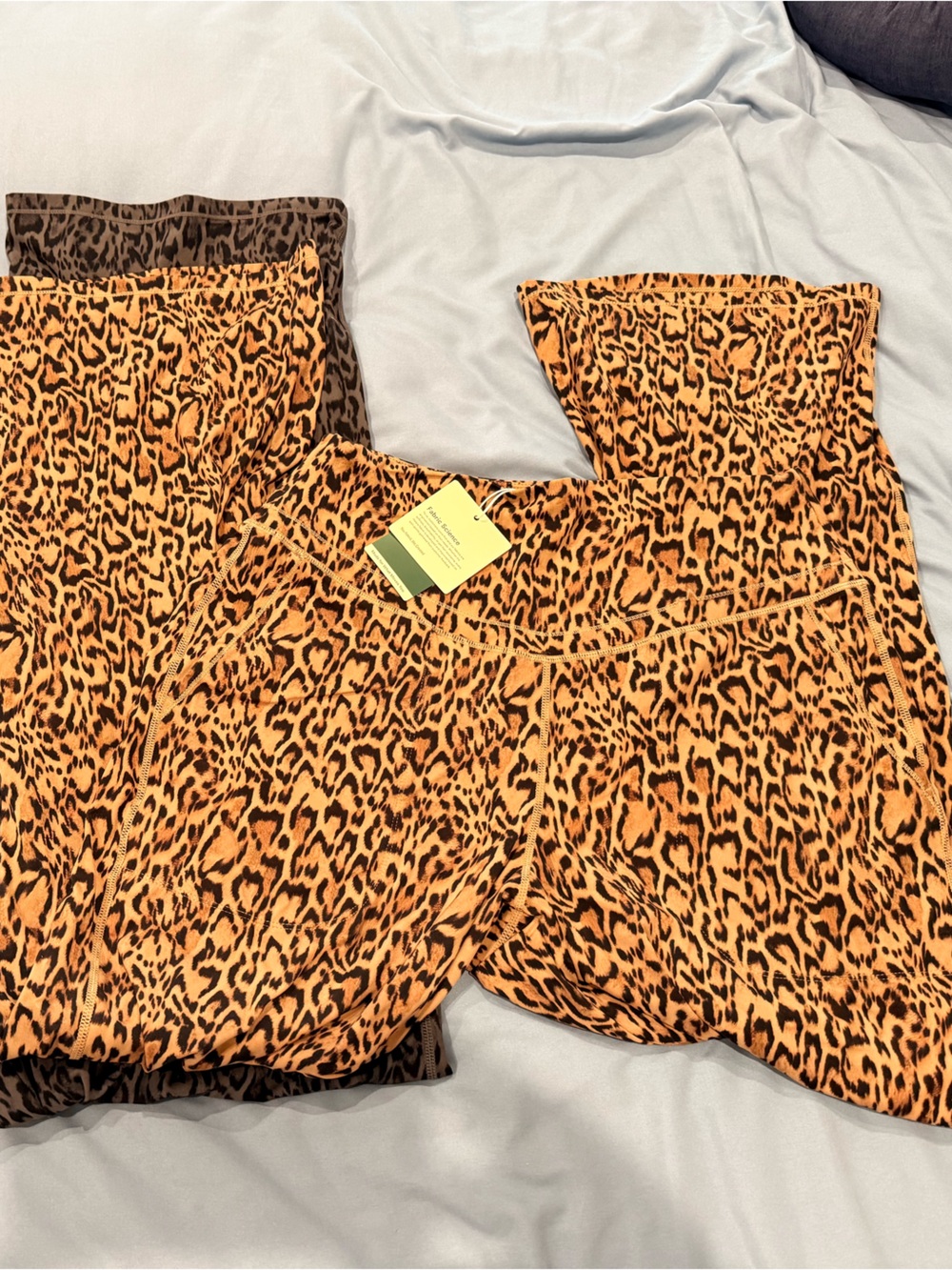 2 pairs of HALARA NWTLeopard Boot Cut Pants in tan and BlacK/Gray and Black